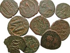 Group Lots [Byzantine]. Lot of 10 Byzantine Bronze Coins. Group lot of 10 Byzantine follis Average grade Fair-Fine. All group lots are sold as-is, returns not accepted. The coins shown are the exact c