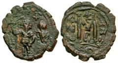 Byzantine Constans II and Constantine IV. 654-668. AE follis (27.4 mm, 6.51 g, 7 h). Constantinople mint, Struck 655/6. No legend, Constans II on left, crowned, wearing military garb and holding long 