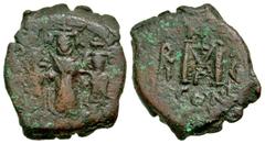 Byzantine Heraclius. 610-641. AE follis (24.5 mm, 7.14 g, 7 h). Constantinople mint, Struck 623/4. anepigraphic, Heraclius standing facing between Martina on left and Heraclius Constantine on right; e