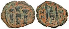 Byzantine Early Caliphate. 636-660. AE follis (25.3 mm, 4.10 g, 6 h). Contemporary Imitation of a Follis of Heraclius (610-641). anepigraphic, Heraclius in the middle; to left, Martina; to right, Hera