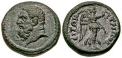 Roman Provincial "Lydia, Tripolis. Time of Hadrian, A.D. 117-138. AE 16 (15.5 mm, 3.60 g, 2 h). Bare head of Herakles left / TPIΠOΛЄITΩN, Nike advancing right, holding wreath and palm over shoulder. G