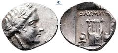 Greek Lycia. Lycian League. Olympos circa 167-81 BC. Drachm AR 15 mm, 2,21 g Laureate head of Apollo right; bow and quiver over shoulder / ΟΛΥMΠH, Kithara; helmet to left; sword and shield to right; a