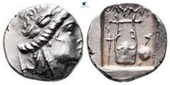 Greek Lycia. Lycian League. Olympos circa 167-81 BC. Drachm AR 14 mm, 2,60 g Laureate head of Apollo right, with bow and quiver over shoulder / ΟΛΥΜΠ, kithara, torch to left, shield and sword to right