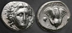 Greek Islands off Caria. Rhodos circa 340-316 BC. Didrachm AR 19 mm, 6,60 g Head of Helios facing slightly right / Rose with bud to right; grape bunch and E to left, [P]OΔION above; all within incuse 