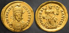Byzantine Theodosius II AD 402-450. Constantinople Solidus AV 21 mm, 4,32 g D N THEODOSIVS P F AVG, helmeted, three-quarter facing bust, holding spear over shoulder and shield decorated with horseman 