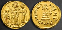 Byzantine Heraclius, with Heraclius Constantine and Heraclonas AD 610-641. Constantinople Solidus AV 20 mm, 4,48 g Heraclonas, Heraclius, and Heraclius Constantine standing facing, each wearing crown 