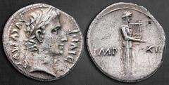 Roman Imperial Augustus 27 BC-AD 14. Lugdunum Denarius AR 19 mm, 3,68 g AVGVSTVS DIVI•F, laureate head right / IMP XII/ [ACT], Apollo Citharoedus of Actium standing right, holding lyre with his left h