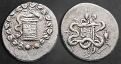 Greek Lydia. Tralleis circa 166-67 BC. Cistophoric Tetradrachm AR 29 mm, 12,59 g Cista mystica with serpent; all within ivy wreath / Bowcase between two serpents; to left, TPAΛ; to right, amphora. Ver