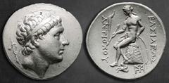 Greek Seleukid Kingdom. Lampsakos. Antiochos Hierax 242-227 BC. Tetradrachm AR 30 mm, 16,98 g Diademed head right / ΒΑΣΙΛΕΩΣ ΑΝΤΙΟΧΟΥ, Apollo Delphios, testing arrow and placing hand on grounded bow, 