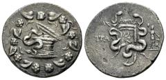LYDIA, Tralleis. Circa 166-67 BC. AR Tetradrachm. Cistophoric coinage. Atta-, magistrate. Struck 133-100 BC. Cista mystica containing serpent; all within ivy-wreath. / Bow in case between two coiled s