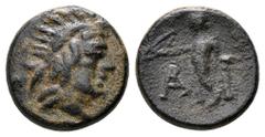 LYCIA, Arykanda. 2nd century BC. Æ. Radiate head of Sozon(?) right. / Apollo standing left, holding bow, resting elbow on column behind him; monogram to left. SNG Copenhagen 47-9; SNG von Aulock 4273-