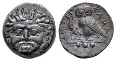 Sicily, Kamarina. Circa 420-405 BC. Æ Tetras. Gorgoneion facing, tongue protruding / Owl standing right, grasping lizard; three pellets (mark of value) in exergue. Westermark & Jenkins 185; CNS 8; SNG