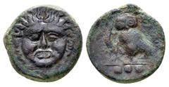 Sicily, Kamarina. Circa 420-405 BC. Æ Tetras. Gorgoneion facing, tongue protruding / Owl standing right, grasping lizard; three pellets (mark of value) in exergue. Westermark & Jenkins 185; CNS 8; SNG