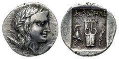 Lycia. Phaselis circa 167-100 BC. Drachm AR 15mm., 2,39g. Pseudo-League coinage. Laureate head of Apollo right; bow and quiver over shoulder / Kithara;helmet to lower left; branch to lower right; all 