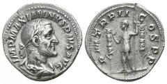 Maximinus Thrax AD 235-238. Rome Denar AR 19mm., 2,95g. IMP MAXIMINVS PIVS AVG, laureate, draped and cuirassed bust right / P M TR P II COS P P, Maximinus standing left between two standards, raising 
