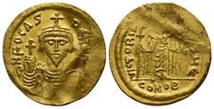 Byzantine Phocas. AD 602-610. Byzantine Solidus AV 21mm., 4,45g. Crowned, draped, and cuirassed bust facing, holding globus cruciger / Angel standing facing, holding staff surmounted by staurogram and