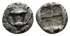 Greek Cyclades. Naxos circa 520-470 BC. Tetartemorion AR 4mm., 0,13g. Kantharos / Quadripartite incuse square. very fine HGC 6, 627 var. (ivy leaf above kantharos); Numismatik Naumann, Auction 49, Lot