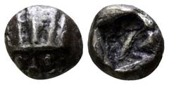Greek Asia Minor. Uncertain mint 500-400 BC. Hemiobol AR 4mm., 0,32g. Radiate head of lion facing / Incuse punch. very fine Rosen 395 var. (diobol); Klein 232 var. (diobol).