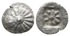 Greek Ionia. Possibly Erythrai circa 480-450 BC. Tetartemorion AR 5mm., 0,28g. Rosette or sunburst with central boss / Eight-rayed star within incuse square. very fine Klein 387; Kraay, Colophon 96, 1