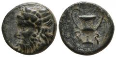 Greek Lydia. Possibly Sardeis circa 400-300 BC. Bronze Æ 11mm., 1,98g. Head of Dionysos left, wearing ivy wreath / Kantharos, F - S (in Lydian) across field. very fine Vögtli, Pergamon, 524.