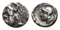 Greek Cilicia. Uncertain mint circa 300 BC. Tetartemorion AR 4mm., 0,24g. Persian king in kneeling-running stance right, holding dagger and bow / Helmeted head of Athena left. very fine Troxell & Kaga