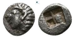 Greek Ionia. Kolophon circa 525-500 BC. Tetartemorion AR 4mm., 0,17g. Archaic head of Apollo to left / Quadripartite incuse square. very fine SNG Kayhan 343; SNG von Aulock 1810.