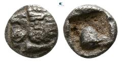 Greek Ionia. Miletos circa 420-390 BC. Tetartemorion AR 4mm., 0,22g. Head of roaring lion left / Bird standing left, pellets flanking, all within incuse square. very fine