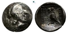 Greek Lycia. Uncertain Dynast circa 400-300 BC. Hemiobol AR or Tetartemorion AR 7mm., 0,16g. Helmeted head of Athena right / Eagle standing left within pelleted square within incuse square, unclear le