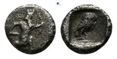 Greek Cilicia. Uncertain mint circa 400-300 BC. Tetartemorion AR 3mm., 0,11g. Persian king or hero in kneeling-running stance right, holding dagger and bow, with quiver over shoulder / Owl standing ri