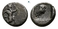 Greek Cilicia. Uncertain mint 350 BC. Tetartemorion AR 4mm., 0,17g. Persian king or hero, wearing kidaris and kandys, quiver over shoulder, in kneeling-running stance right, holding dagger in right ha