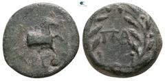 Greek Achaia. Aigeira. ΠΑ- (Pa-), magistrate circa 100-50 BC. Dichalkon Æ 13mm., 2,31g. AIΓIP[A.?], forepart of goat to right / Large ΠΑ within laurel wreath. very fine Cf. Mionnet, Description de méd