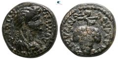 Roman Provincial Lydia. Philadelphia. Domitia AD 82-96. ΛΑΓΕΤΑΣ (Lagetas), magistrate Bronze Æ 13mm., 3,11g. ΔOMITIA AYΓΟVC, draped bust of Domitia right / Π ΛΑΓЄT ΦΙΛΑΔЄΛΦЄ-ωN, bunch of grapes on vin