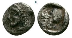 Greek Mysia. Lampsakos circa 500-450 BC. Tetartemorion AR 4mm., 0,20g. Head of Apollo left, wearing taenia / Helmeted head of Athena left within incuse square. nearly very fine Asia Minor Coins, #1276
