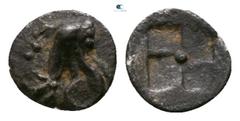 Greek Ionia. Teos circa 460-420 BC. Tetartemorion AR 4mm., 0,10g. Griffin seated right, left paw raised / Incuse square of mill-sail pattern, pellet in center. very fine Balcer -; SNG Kayhan -; SNG Co
