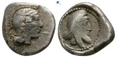 Greek Dynasts of Lycia. Uncertain mint. Kherei 410-390 BC. Hemidrachm AR 10mm., 2,06g. Helmeted head of Athena right, monogram (?) behind / Head of Kherei right, wearing bashlyk, in pelleted round bor