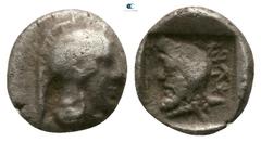 Greek Dynasts of Lycia. Uncertain mint. Kherei 410-390 BC. Obol AR 6mm., 0,56g. Helmeted head of Athena right / Head of Kherei left, wearing Persian tiara, in right field legend, all within incuse squ