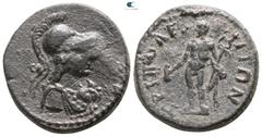 Roman Provincial Lydia. Tripolis. Pseudo-autonomous issue circa AD 117-192. Bronze Æ 18mm., 4,81g. Helmeted bust of Athena right, with aegis / TΡIΠOΛEITΩN, Hermes, naked but for chlamys over shoulders