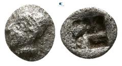 Greek Asia Minor. Uncertain mint circa 520-500 BC. Tetartemorion AR 4mm., 0,13g. Bearded and helmeted head of Ares left / Quadripartite incuse square. nearly very fine BMC -; SNG Copenhagen -; Von Aul