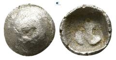 Greek Caria. Uncertain mint circa 400-300 BC. Tetartemorion AR 4mm., 0,16g. Head of bull (?) / Uncertain symbol. nearly very fine SNG Kayhan-; SNG Copenhagen-; SNG Keckman -.