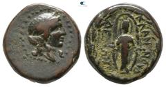 Greek Lydia. Klannudda circa 100-0 BC. Bronze Æ 13mm., 3,21g. Laureate head of Apollo right / KΛANNOYΔ-ΔEΩN to left and right of female cult image facing in long chiton, kalathos and long veil, arms o