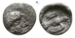 Greek Ionia. Magnesia ad Maeander . Archepolis circa 459 BC. Tetartemorion AR 4mm., 0,13g. Diademed or laureate, bearded male head right / Eagle flying right within incuse square. very fine Cf. Nollé 