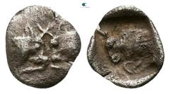 Greek Caria. Uncertain mint circa 500 BC. Tetartemorion AR 5mm., 0,13g. Confronted foreparts of bulls / Forepart of bull left, within incuse square. very fine SNG Keckman 912; SNG Kayhan 968-70.