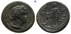Roman Provincial Lydia. Saitta. Pseudo-autonomous issue circa AD 100-300. Bronze Æ 14mm., 1,92g. Laureate and draped bust of Herakles right / СΑΙΤΤΗΝΩΝ, Hermes standing left, holding purse and caduceu
