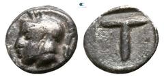 Greek Arkadia. Tegea circa 423-400 BC. Tetartemorion AR 4mm., 0,20g. Helmeted head of Athena left / T within incuse square. nearly very fine BCD Peloponnesos 1721.
