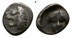 Greek Satraps of Caria. Mylasa. Hekatomnos 392-377 BC. Tetartemorion AR 5mm., 0,25g. Head of roaring lion left / EKA, head of Apollo facing slightly left. very fine Klein 507.