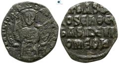 Byzantine Basil I the Macedonian AD 867-886. Constantinople Follis Æ 24mm., 4,80g. Basil seated facing on throne with decorative back, holding labarum and akakia / Legend in four lines. very fine Sear
