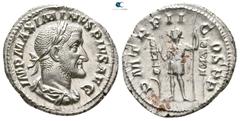 Roman Imperial Maximinus I Thrax AD 235-238. Rome Denarius AR 18mm., 2,93g. IMP MAXIMINVS PIVS AVG, laureate, draped, and cuirassed bust right / P M TR P II COS P P, Maximinus standing left between tw