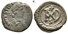 Byzantine Justinian I AD 527-565. Struck 537-552. Carthago Half Siliqua AR 14mm., 1,29g. Diademed, draped, and cuirassed bust right / Monogram; cross above, retrograde ς below. good fine DOC –; MIBE 5