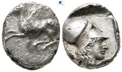 Greek Corinthia. Corinth circa 431-400 BC. Third Period Stater AR 20 mm., 8,13 g. Pegasos flying left with straight wings, koppa below / Head of Athena to right, wearing Corinthian helmet, and with ha
