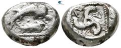 Greek Dynasts of Lycia. Uncertain mint. Thap..., Dynast of Telmessus? 480-460 BC. Foureé Stater 19 mm., 7,74 g. Big dolphin swimming right; smaller dolphin below / Triskelis within dotted incuse squar